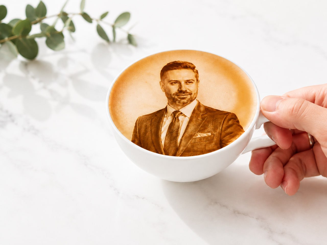 Un portrait imprimé sur la mousse d’un latte